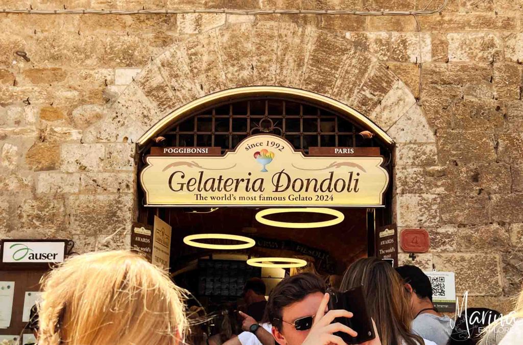 Line in front of Gelateria Dondolini in San Gimignano near Florence, Italy