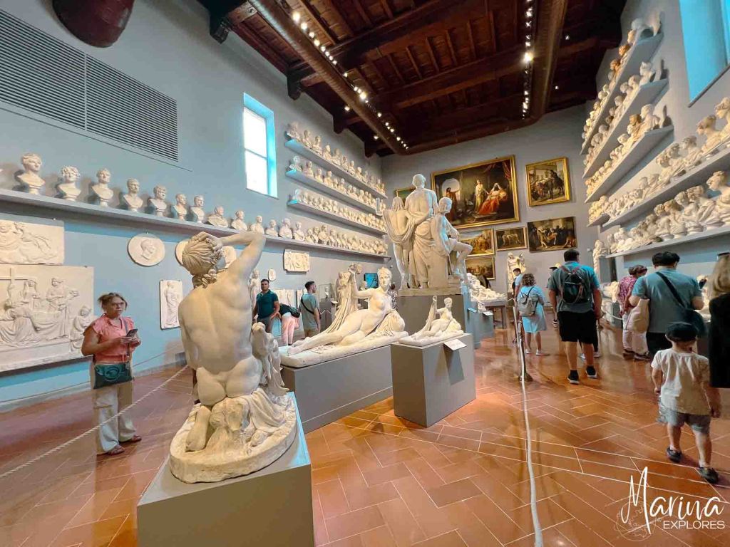 Room filled with sculptures at Accademia Galleria in Florence, Italy