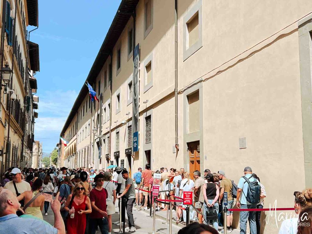 Line of people waiting at Accademia Galleria in Florence, Italy
