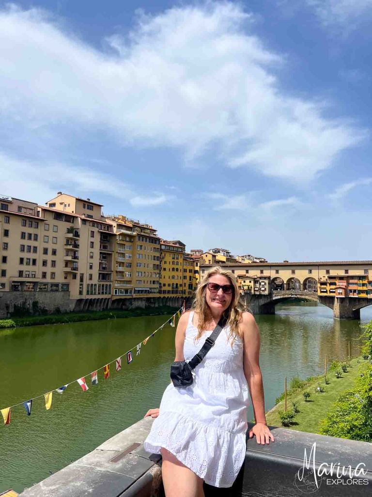 Marina posing with Ponte Vecchio in Florence, Italy