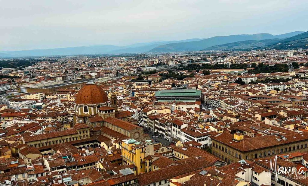 View of city from observation deck at top of Duomo in Florence, Italy