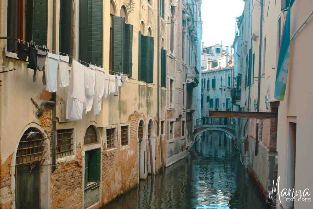 Laundry hanging on small canal Venice, Italy