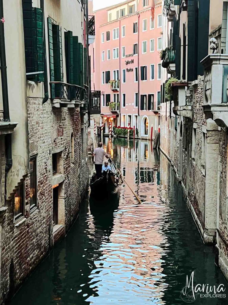 Gondola on a small canal Venice, Italy