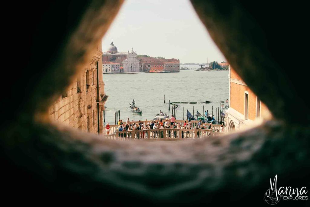 View of lagoon from inside Bridge of Sighs Venice, Italy